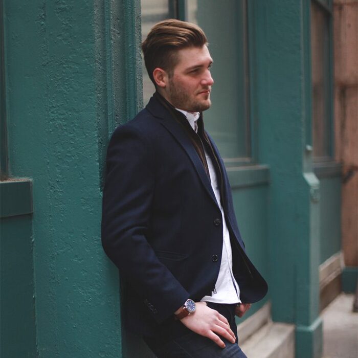 Headshot of barber outside of Dapper Gents barber shop