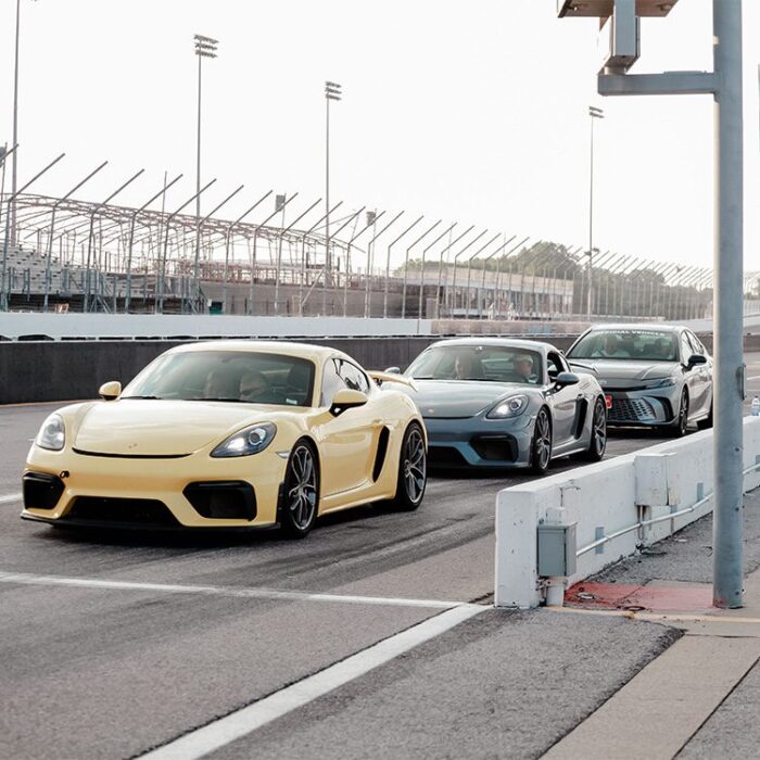 Cars lined up to race at race track